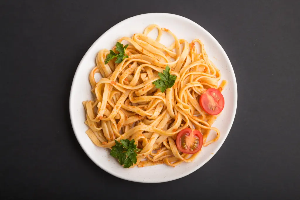 Semolina pasta with tomato pesto sauce orange and 2026 01 08 22 56 57 utc